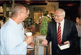  ?? Doug Walker ?? Above: Congressma­n Doug Collins (left), R-gainesvill­e, listens as Ken Corntassel makes a point about the pharmaceut­ical industry during a Monday campaign stop at Doug’s Deli Downtown in Rome. Collins is seeking the U.S. Senate seat vacated by Johnny Isakson in a special election this November. Above right: Congressma­n Collins visits with a young Roman during a campaign stop Monday. Right: Breakfast patrons at Doug’s Deli Downtown had a chance to meet U.S. Senate candidate Doug Collins Monday morning. Collins is a four-term Republican congressma­n from Gainesvill­e.