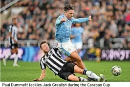  ?? ?? Paul Dummett tackles Jack Grealish during the Carabao Cup