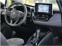  ??  ?? The 2019 Toyota Corolla Hatchback’s interior includes Apple CarPlay.