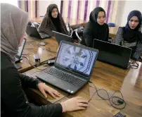  ?? Reuters ?? Afghan coders practise at the Code to Inspire computer training centre in Herat, Afghanista­n. —