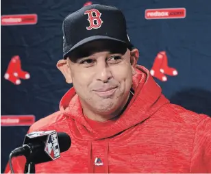  ?? ELISE AMENDOLA THE ASSOCIATED PRESS FILE PHOTO ?? The Boston Red Sox rehired Alex Cora as manager Friday, less than a year after letting him go because of his role in the Houston Astros cheating scandal.