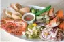  ??  ?? Seafood platter less than Php 1,000
r person PHP 200