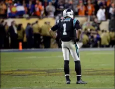  ??  ?? Carolina Panthers’ Cam Newton stands on the field as the clock winds down in the second half of the NFL Super Bowl 50 football game against the Denver Broncos on Sunday in Santa Clara. The Broncos defeated the Panthers, 24-10. AP PHOTO