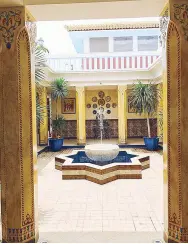  ??  ?? The Moroccan courtyard is made refreshing with a fountain made from Romblon marble.