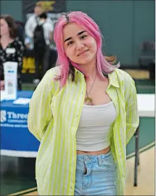  ?? SEAN D. ELLIOT/THE DAY ?? New London High School senior Stacey Rivera Lopez attends a career expo May 13 on the school’s campus.