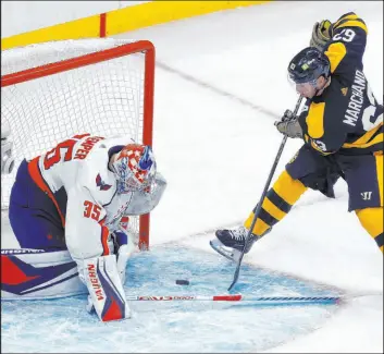  ?? Michael Dwyer
The Associated Press ?? Capitals goalie Darcy Kuemper stops a shot by Bruins left wing Brad Marchand in Washington’s 2-1 victory Saturday at TD Garden. Kuemper finished with 27 saves.