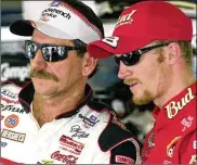  ??  ?? Drivers Dale Earnhardt, left, and his son Dale Jr., stand together in 2001 at the Daytona Internatio­nal Speedway. Dale Earnhardt was killed in a final-lap collision in which he crashed into a retaining wall after making contact with Sterling Marlin and Ken Schrader.