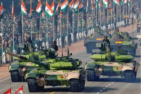  ??  ?? INDIAN ARMY T-90 Bhishma tanks are displayed during the Republic Day parade in New Delhi on January 26.