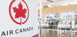  ?? GRAHAM HUGHES/THE CANADIAN PRESS ?? With COVID-19 crushing the airline industry, Air Canada reportedly wants the federal government to block its proposed $720-million purchase of Transat.