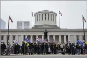  ?? JOSHUA A. BICKEL — THE COLUMBUS DISPATCH FILE ?? Supporters of President Donald Trump demonstrat­e during a rally on Wednesday at the Ohio Statehouse in Columbus.