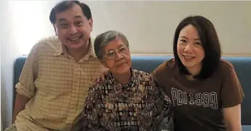  ?? ?? pauline (right) with her husband and mother. — photos: Homage malaysia