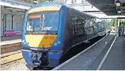  ??  ?? Joyful Lucy Holbrook is reunited with her engagement ring after 300 seats were ‘torn out’ to find it on a c2c train like this one, left