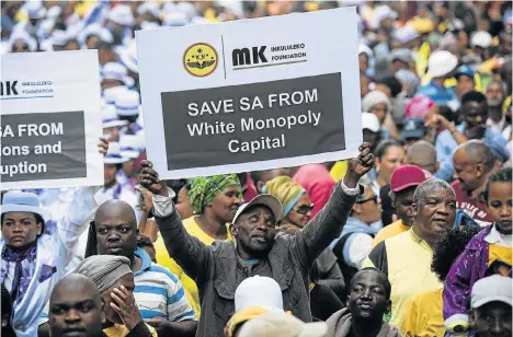  ?? Picture: DAVID HARRISON ?? ZUMA, OUR MAN: ANC supporters in Plein Street, outside parliament, await the outcome of the motion