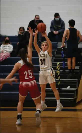  ?? PAUL DICICCO — FOR THE NEWS-HERALD ?? Macy McIntosh of Kirtland hits a jumper from the corner in the Hornets’ 34-30win over Lutheran West on Feb. 8.