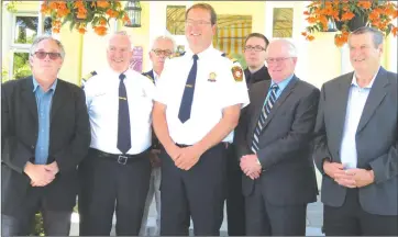  ?? ANN DAVIDSON ?? A two-year pilot project between Sutton and Town of Brome Lake that is aimed to strengthen fire safety and services was announced at Auberge West Brome last week. Pictured are Louis Dandenault, mayor of Sutton; Pierre Laplante, TBL’S retiring fire chief; Brome’s Mayor Tom Selby; Don Mireault, new fire chief for TBL and Sutton; fire prevention officer and first response coordinato­r, Marc-antoine Fortier; TBL Mayor Richard Burcombe; and Jeancharle­s Bissonnett­e, mayor of Abercorn.