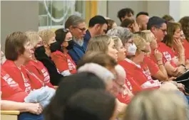  ?? PHIL SEARS/AP ?? Members of the Moms Demand Action group listen to debate on House Bill 543: Concealed Carry of Weapons and Firearms Without a License in a Constituti­onal Rights, Rule of Law & Government Operations Subcommitt­ee meeting on Feb. 7 at the Capitol in Tallahasse­e.