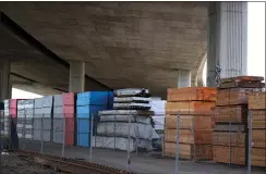 ?? ?? A lumber yard leases space from Caltrans under Interstate 880near Fifth Avenue in Oakland. It failed an inspection because of combustibl­e materials.