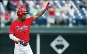  ?? RICH SCHULTZ — THE ASSOCIATED PRESS ?? Phillies center fielder Nick Williams gestures after his two-run double in the fourth inning against the Miami Marlins on Thursday.