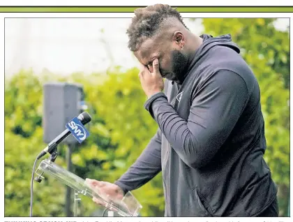  ?? AP ?? THINKING OF YOU, KID: John Franklin-Myers cries while talking to the media about his four-year, $55 million extension with the Jets, saying he wished his son had been with him when he signed the deal.