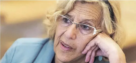  ?? Foto: dpa ?? Hauptstadt-Bürgermeis­terin Manuela Carmena bekommt die Verschuldu­ng von Madrid zunehmend in den Griff.