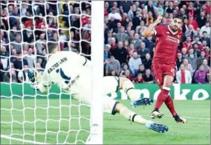  ?? OLI SCARFF/AFP ?? Emre Can scores Liverpool’s third in their Champions League qualifier second leg against Hoffenheim at Anfield on Wednesday night.