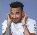  ??  ?? Lewis Hamilton looks all ears but was occasional­ly disinteres­ted