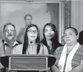  ?? Federico Parra AFP/Getty Images ?? DELCY RODRIGUEZ, at microphone, is president of Venezuela’s newly formed constituen­t assembly, which issued a decree declaring its ability to pass laws.