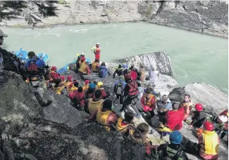  ?? PICTURES: SUPPLIED ?? Tribute . . . Friends, family and colleagues gather on the bank of the Shotover River on Sunday.