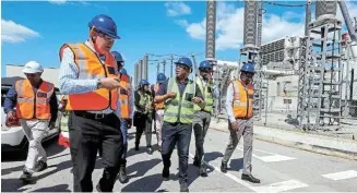  ?? Pictures: WERNER HILLS ?? POWERING UP: During the Dedisa Peaking Power plant site visit yesterday are, from left, ENGIE Peakers Operations chief executive Christo Spammer, electricit­y minister Kgosientsh­o Ramokgopa and Eastern Cape economic developmen­t MEC Mlungisi Mvoko