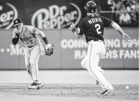  ?? Jeffrey McWhorter / Associated Press ?? Alex Bregman, left, reacts after being hit in the chin by a 99 mph ground ball off Shin-Soo Choo’s bat in the third inning Thursday.