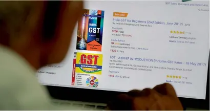  ?? — AP ?? India has put in place a goods and services tax in July 2017 to help remedy the inefficien­cies of the domestic tariff system.