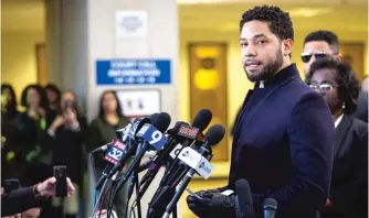  ?? SUN-TIMES FILE PHOTO ?? Jussie Smollett speaks to reporters after all charges against him were dropped in March.