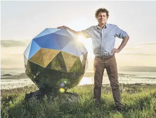  ?? PHOTO: SUPPLIED ?? Thin end of the wedge? Rocket Lab founder Peter Beck with the Humanity Star a 65panel, highly reflective carbon fibre sphere that, when launched in January last year, was viewable with the naked eye from Earth’s surface.