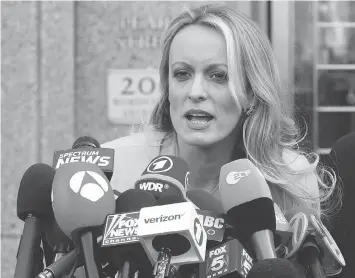  ?? MARY ALTAFFER / THE ASSOCIATED PRESS ?? Adult film actress Stormy Daniels seems to have an innate understand­ing of what scares the bejesus out of U.S. President Donald Trump, columnist Kelly McParland writes.