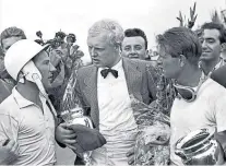  ??  ?? Danger men: (from left to right) Stirling Moss, Mike Hawthorn and Peter Collins bravely competed under tough conditions