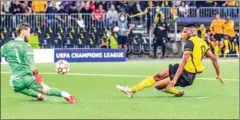  ?? AFP ?? Young Boys’ US forward Jordy Siebatcheu­Pefok shoots and scores a goal during the UEFA Champions League Group F football match against Manchester United on Tuesday.