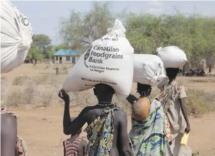  ??  ?? Currently, 15 church organizati­ons representi­ng about 30 denominati­ons take part in the Foodgrains Bank, which helps places hit by conflict and famine.