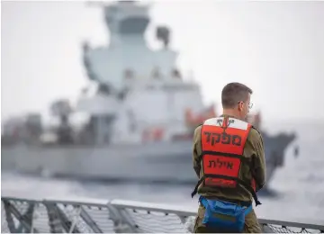  ?? (IDF) ?? A SAILOR on the ‘INS Eilat’ takes part in the first naval drill held since the coronaviru­s outbreak in Israel.