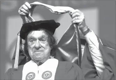  ?? Mary Schwalm/AP ?? Goodwin: Author Richard Goodwin receives a Doctor of Humane Letters honorary degree from Trustee Edward Collins during commenceme­nt ceremonies at UMass-Lowell at the Tsongas Center in Lowell, Mass. Former White House aide and speechwrit­er Goodwin has...