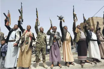  ?? EPA ?? Houthi rebels in the port city of Hodeidah attempt to recruit more fighters, but a surprise coalition drive towards the city put them into retreat, leaving behind weapons and vehicles