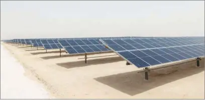  ?? ?? The Al Kharsaah Solar PV Independen­t Power Producer Project will commit 1.8m tonnes of carbon savings to Qatar 2022.