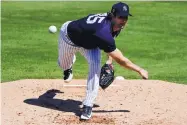  ?? FRANK FRANKLIN II/ASSOCIATED PRESS FILE ?? Gerrit Cole, shown pitching for the New York Yankees in an exhibition game in February in Tampa, Florida, would lose 77 percent of his salary under MLB’s first proposal.
