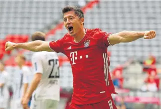  ?? /Alexander Hassenstei­n/ Getty Images ?? Hot shot: Robert Lewandowsk­i played a huge part in Bayern’s success, scoring 34 goals to end the season the league’s top scorer for the fifth time.