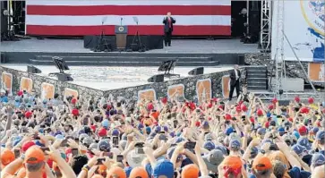  ?? Steve Helber Associated Press ?? PRESIDENT TRUMP’S speech to the National Scout Jamboree in Glen Jean, W.Va., inspired hearty boos at his references to Hillary Clinton and President Obama — and objections from ex-Scouts, parents and others.