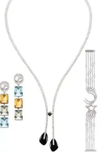  ??  ?? From left: Borgonuovo earrings in white gold with diamonds, topaz, citrines and prasiolite­s; Sì necklace in white gold with onyx and diamonds; Firmamento bracelet in white gold with diamonds