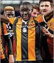  ??  ?? SURPRISE PACKAGE: Niasse celebrates the clincher for Hull