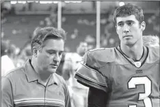  ?? AP file photo ?? Former Heisman Trophy finalist Joey Harrington (right) had harsh words about some NFL coaches he played for, including Steve Mariucci (left) and Bobby Petrino.