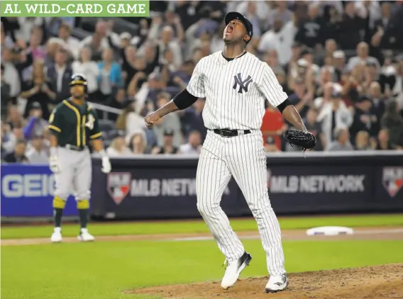  ?? Frank Franklin II / Associated Press ?? Luis Severino exults after striking out Marcus Semien with the bases loaded to end the fourth. The Yankees’ starter combined with four relievers on a five-hitter.