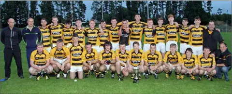  ??  ?? Rathnure celebratin­g their Greenstar Under-21 hurling Roinn 1 championsh­ip title win over neighbours Rathgarogu­e-Cushinstow­n.