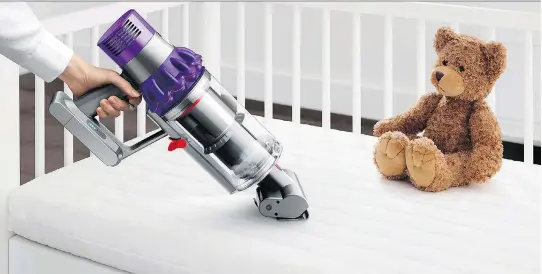  ??  ?? Dyson’s latest cordless vacuum, the Cyclone V10, runs for 60 minutes and transition­s from floor to hand-held easily to clean a variety of surfaces.